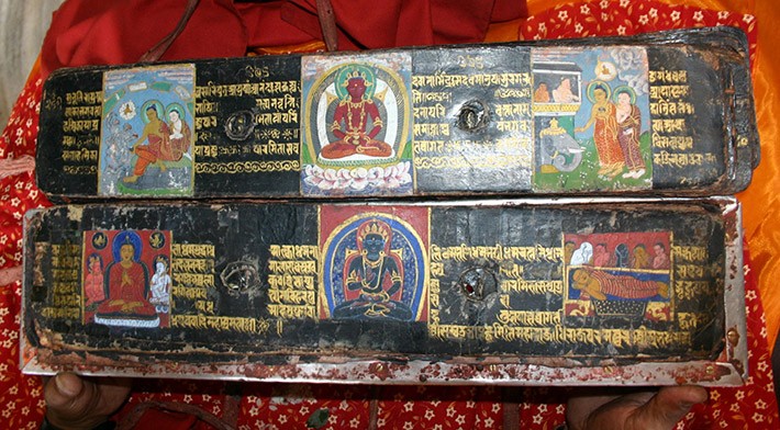 Folios 296v-297r with painted panels restored during the 20th century.